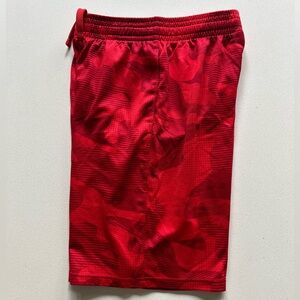 Under Armour red camo patterned shorts in size YL